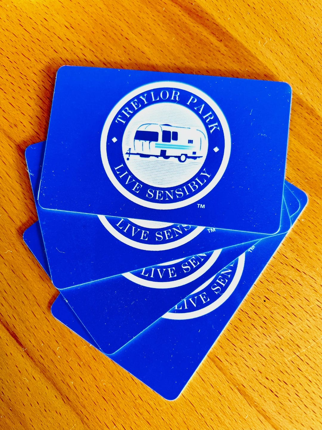 Treylor Park gift cards on a wooden table